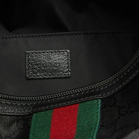 men's gucci toiletry bag|Gucci men's handbags.